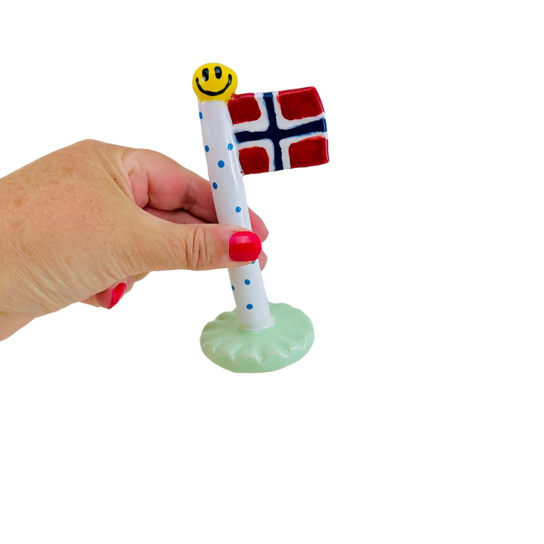 Skønt norsk flag med smiley på den ene side af flagknoppen.