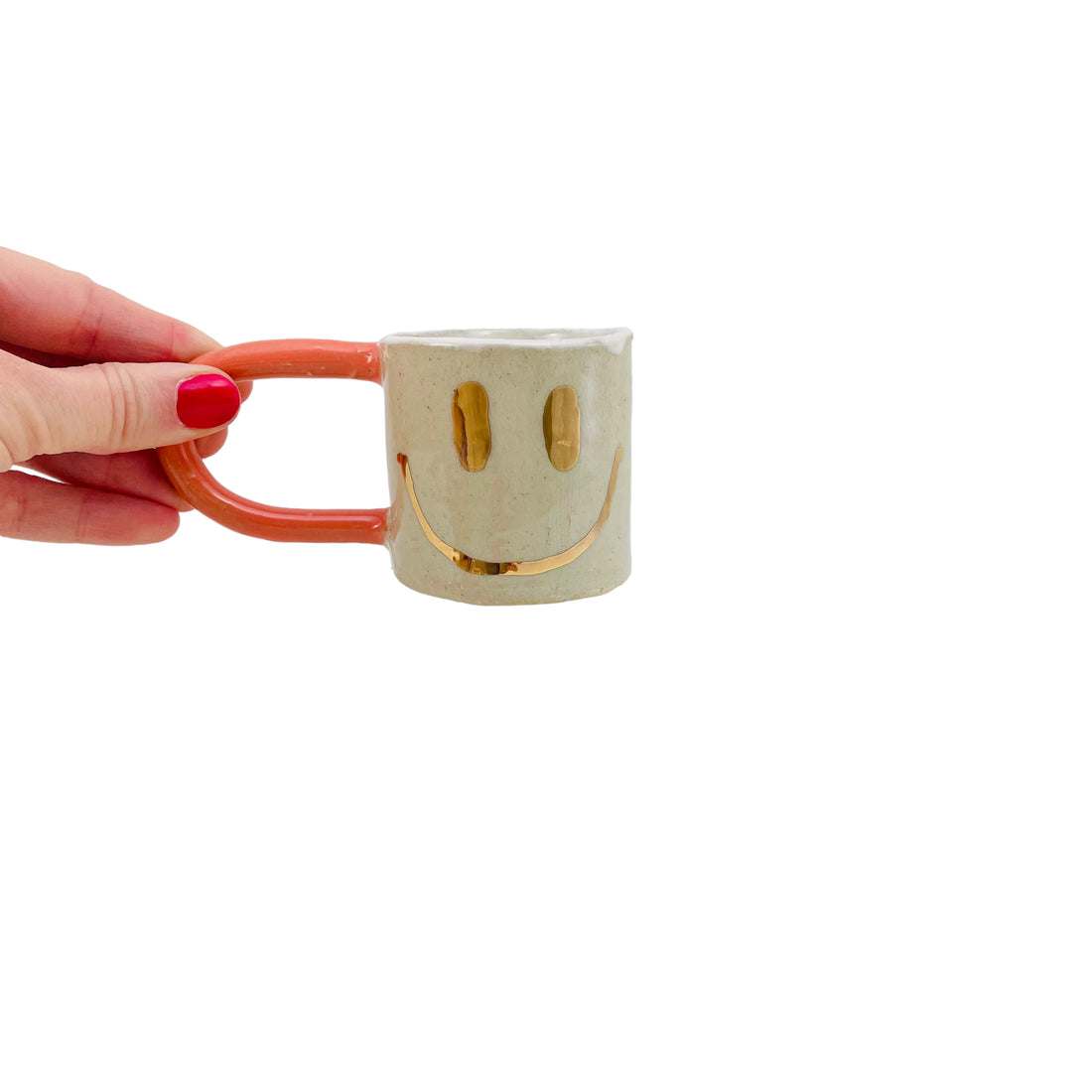 Guld Smiley Espressokrus med orange hank og cremefarvet indre